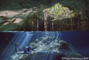 Cave split. Cenote Tajma Ha by Petteri Viljakainen 